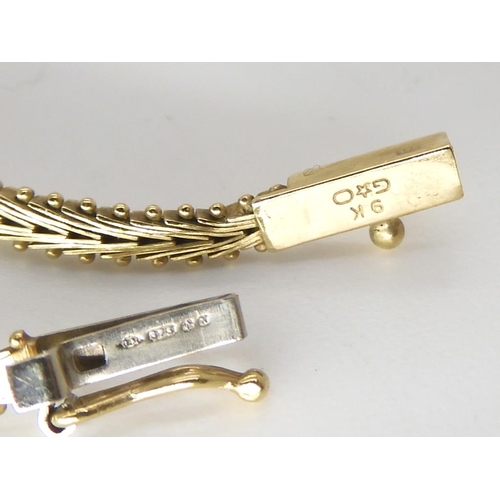 549 - A pair of 9ct gold cufflinks, a three colour gold bracelet, and a yellow metal setting set with a pi... 