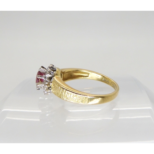 554 - An 18ct gold synthetic ruby and diamond retro ring, size M1/2, weight 5gms