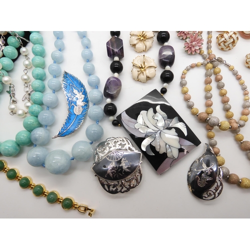 613 - A collection of silver and costume jewellery from The Jewellery Channel to include aquamarine and ro... 