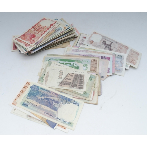 475 - BANK NOTES a collection of world wide bank notes with British, European, Asian, American and African... 