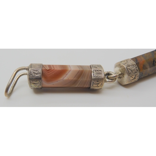 2719 - A SCOTTISH AGATE BRACELETthe octagonal baton links displaying a variety of jaspers and agates, mount... 