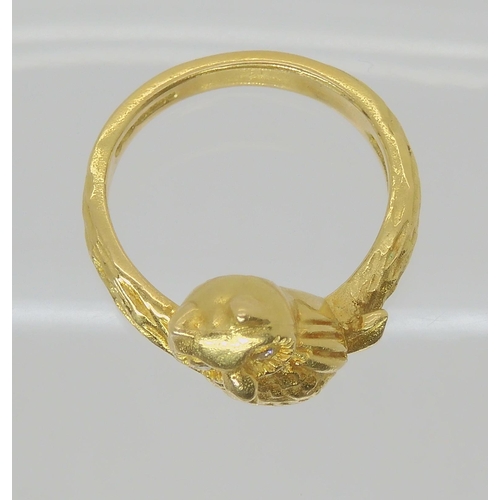 2736 - AN 18CT GOLD OWL RINGwith diamond set eyes. Full Birmingham import marks. Finger size L, weight 6.8g... 