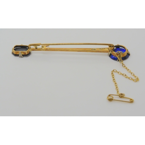 2737 - AN OPAL BAR BROOCHthe yellow and white metal bar brooch, is set with two lively opal doublets. Brooc... 