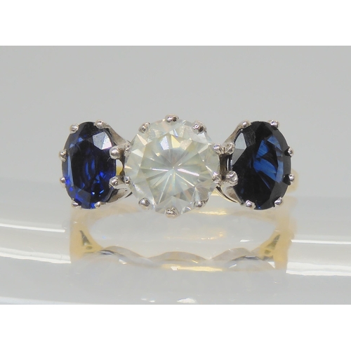 2738 - A SUBSTANTIAL SAPPHIRE AND DIAMOND RINGset in a 18ct yellow and white gold classic crown setting the... 