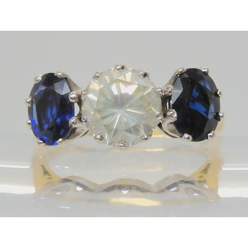 2738 - A SUBSTANTIAL SAPPHIRE AND DIAMOND RINGset in a 18ct yellow and white gold classic crown setting the... 