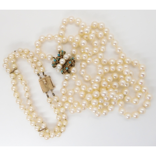 2746 - A PEARL NECKLACE AND BRACELETwith a 14k gold pearl and turquoise clasp with special safety feature t... 