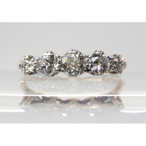 2750 - A FIVE STONE DIAMOND RINGmounted in 18ct yellow gold and platinum. Set with estimated approx 0.75cts... 