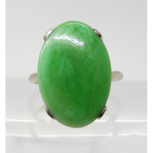 2752 - A CHINESE GREEN HARDSTONE RINGwith un-hallmarked fine white metal mount, the hardstone dimensions ar... 
