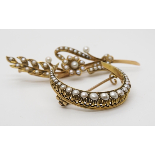 2754 - TWO VINTAGE PEARL BROOCHESto include a crescent moon brooch, stamped 15ct and set with split pearls ... 