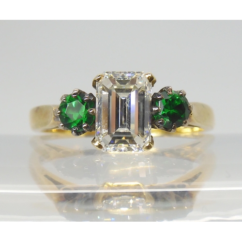 2770 - AN UNUSUAL DIAMOND AND DIOPSIDE RINGmounted in 18ct yellow gold with full hallmarks for London 1981.... 