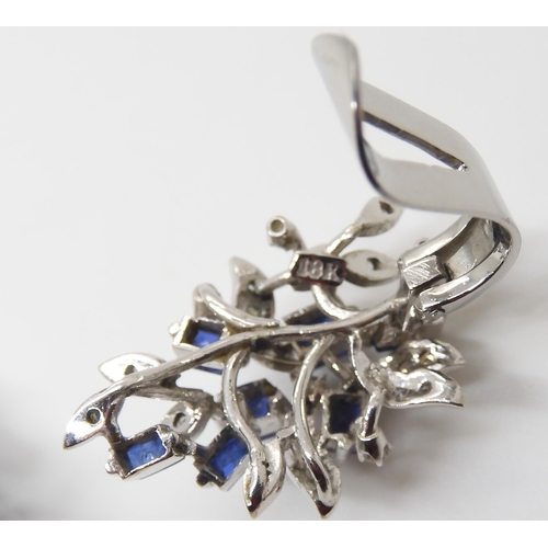 2771 - A PAIR OF SAPPHIRE & DIAMOND EARRINGSmounted throughout in white metal bearing a Chinese hallmar... 