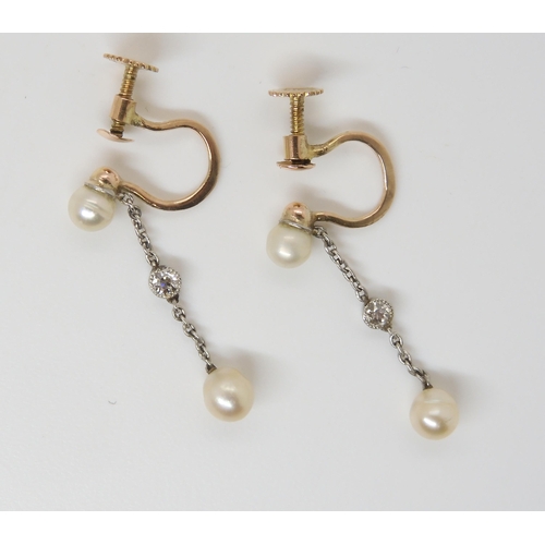 2773 - A PAIR OF PEARL & DIAMOND EARRINGSmounted in yellow 9ct gold and white metal, the pearl studs to... 
