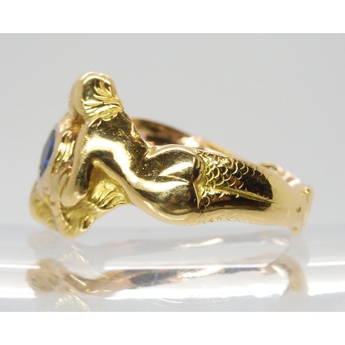 2776 - A FRENCH ART NOUVEAU MERMAID RINGthe two mermaids with flowing hair embrace a sapphire. Stamped with... 