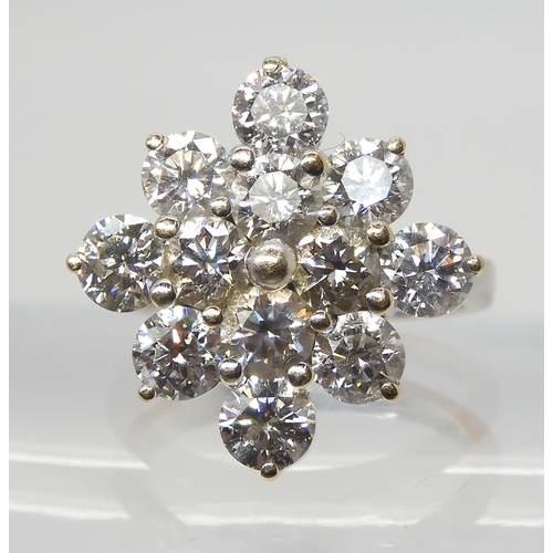 2777 - A SUBSTANTIAL DIAMOND CLUSTER RINGset with estimated approx 3.60cts of brilliant cut diamonds, mount... 