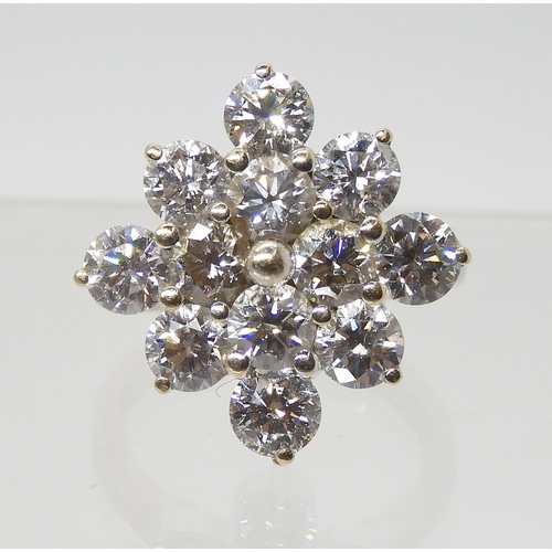 2777 - A SUBSTANTIAL DIAMOND CLUSTER RINGset with estimated approx 3.60cts of brilliant cut diamonds, mount... 
