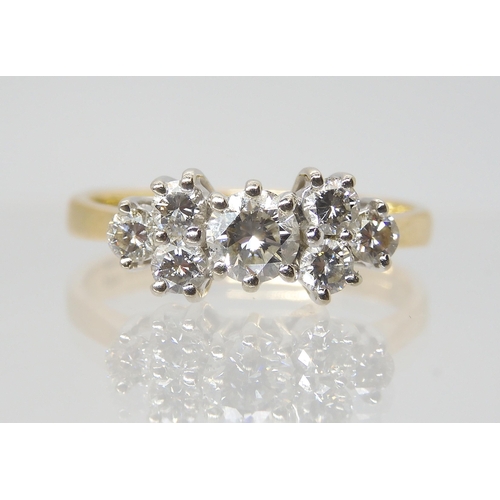 2784 - AN 18CT GOLD DIAMOND CLUSTER RINGset with estimated approx 0.60cts of brilliant cut diamonds, finger... 