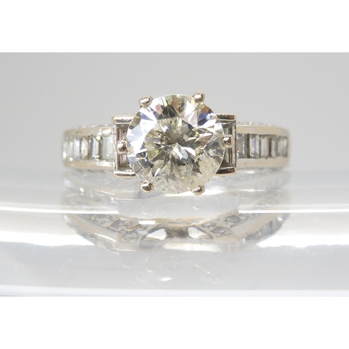 2788 - A SUBSTANTIAL DIAMOND DRESS RINGset with an estimated approx 2ct diamond set to the centre, with bag... 
