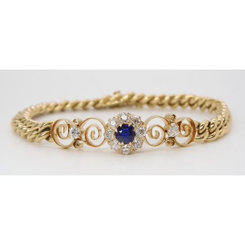 2789 - A SAPPHIRE AND DIAMOND FLOWER BRACELETset throughout in bright yellow metal, with diamond and sapphi... 