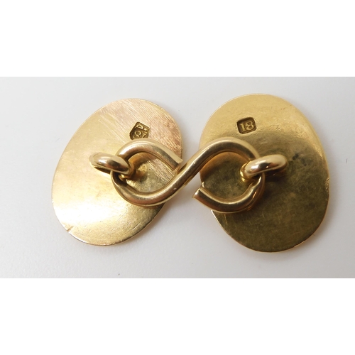 2796 - A PAIR OF GOLD CUFFLINKSwith plain polished faces, stamped 18 to the reverse. Weight 15.6gms ... 