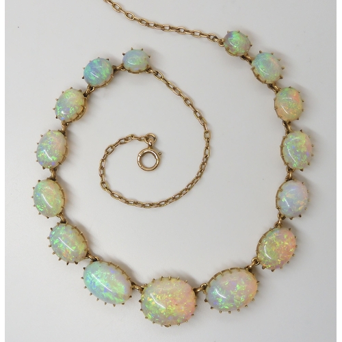 2798 - A SUBSTANTIAL OPAL NECKLACEmounted in 15ct gold throughout with delicate multi claw crown settings. ... 