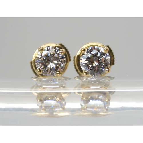 2800 - FRENCH DIAMOND EAR STUDSmounted in 18ct gold, with the French eagle's head hallmark, each stud is es... 
