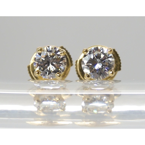 2800 - FRENCH DIAMOND EAR STUDSmounted in 18ct gold, with the French eagle's head hallmark, each stud is es... 