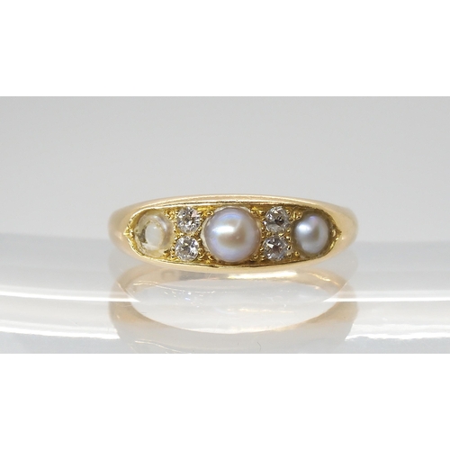 2803 - A PEARL & DIAMOND RINGmounted throughout in 18ct yellow gold with Chester hallmarks for 1905, fi... 