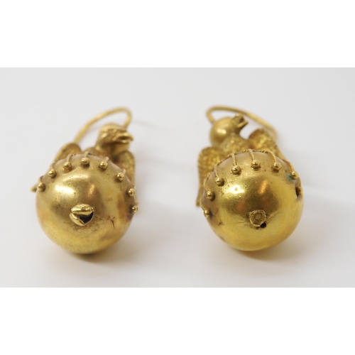 2804 - A PAIR OF ETRUSCAN REVIVAL EARRINGSa granulation and wire work decorated ball surmounted by an eagle... 