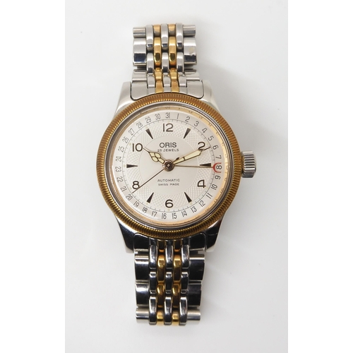 2877 - AN ORIS AUTOMATIC WRISTWATCHwith two tone cream textured dial with gold coloured chevron and Arabic ... 