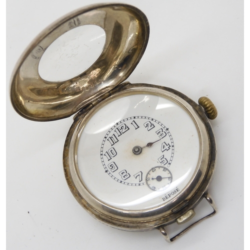2886 - AN UNUSUAL ROLEX HALF HUNTER WRISTWATCHa trench watch, with black enamelled chapter ring, white enam... 