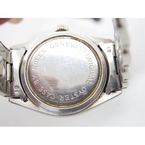 2896 - A GENTS TUDOR OYSTER WRISTWATCH the silvered dial with Tudor Rose Logo and diamond cut chevron numer... 