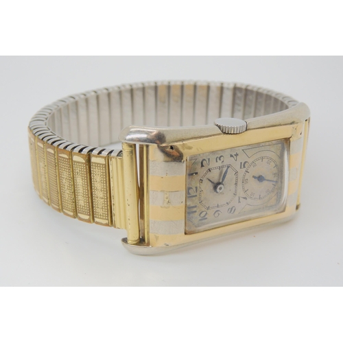 2898 - A VINTAGE ROLEX BRANCARD TIGER STRIPEThe yellow and white gold, striped slightly fluted case is stam... 