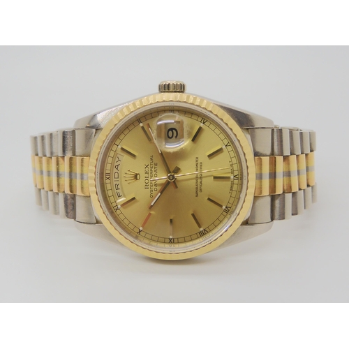 2901 - A ROLEX OYSTER PERPETUAL DAYDATEwith gold coloured dial gold baton numerals, day and date apertures.... 