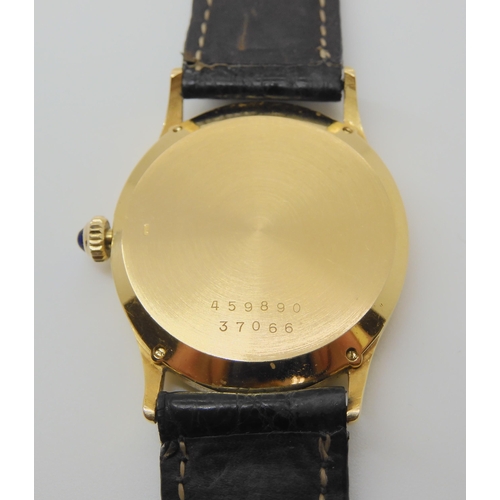 2902 - AN 18CT GOLD BAUME & MERCIER BAUMATICgents watch, with oval gold coloured dial, black hands and ... 