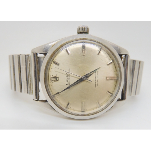 2903 - A STAINLESS STEEL ROLEX OYSTER PERPETUALwith silvered dial, silver coloured baton numerals and hands... 