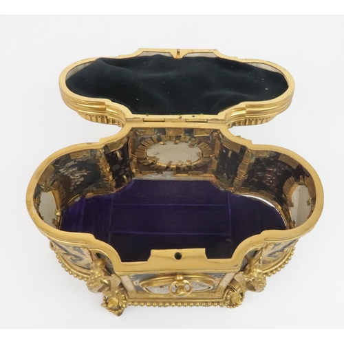 2176 - A MID 19TH CENTURY GRAND TOUR GILT METAL CASKETinset with shell cameos depicting pastoral scenes, wi... 
