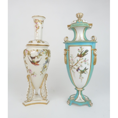 2178 - A CROWN DERBY PORCELAIN URN AND COVERthe white ground with three panels painted with hummingbirds am... 