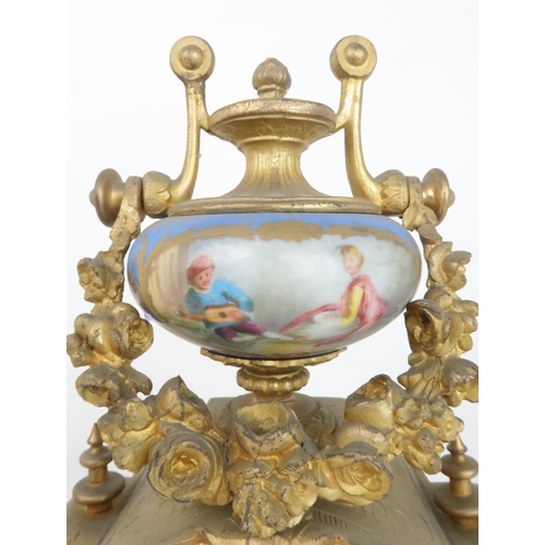 2194 - A FRENCH ORMOLU MANTEL CLOCKwith Sevres style panels and dial, with Japy Freres movement, 35cm high,... 