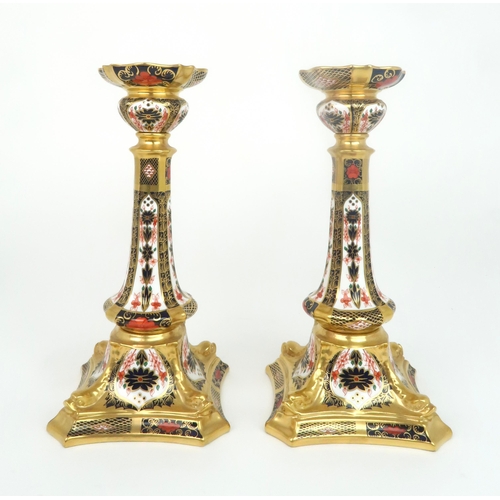2198 - A PAIR OF ROYAL CROWN DERBY CANDLESTICKSin 1128 pattern, 27cm high