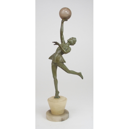 2213 - A FRENCH ART DECO FIGURE OF A WOMANmodelled balancing a ball on one hand and standing on one leg, wi... 