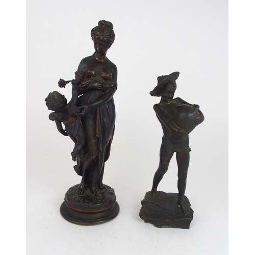 2224 - A BRONZE FIGURE OF CUPID AND PSYCHE42cm high together with a spelter figure of a boy carrying an oil... 