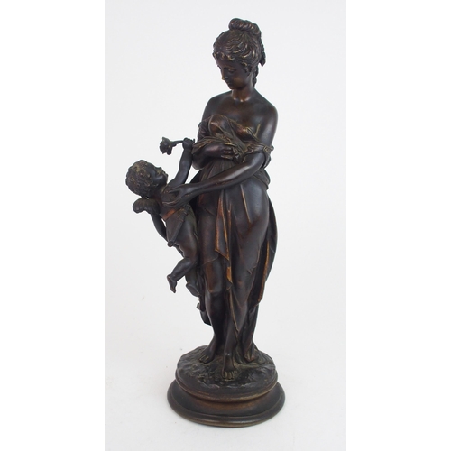 2224 - A BRONZE FIGURE OF CUPID AND PSYCHE42cm high together with a spelter figure of a boy carrying an oil... 