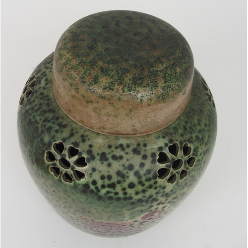 2225 - A RUSKIN POTTERY POT POURRI GINGER JAR AND COVERof typical form with mottled green and sang de boeuf... 