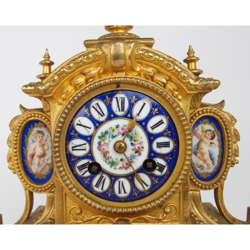 2230 - A 19TH CENTURY FRENCH ORMOLU MANTEL CLOCKwith porcelain dial, panels and finial, painted with cherub... 