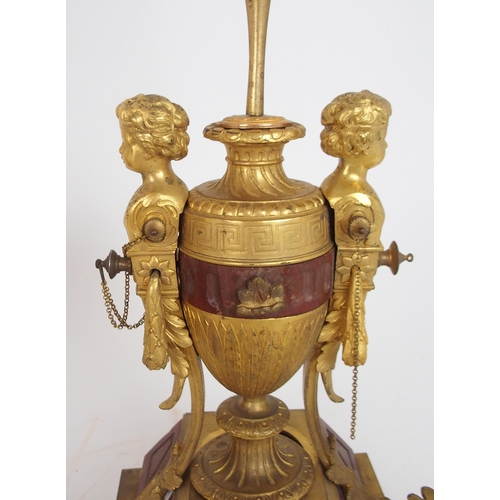 2231 - A PAIR OF 19TH CENTURY ORMOLU AND RUSSO MARBLE CANDLESTICKSeach with a pair of caryatids supporting ... 