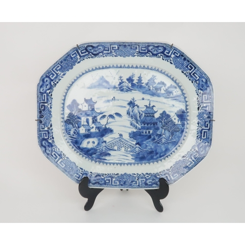 2351 - A SET OF THREE CHINESE EXPORT BLUE AND WHITE OCTAGONAL PLATTERSthe platters depicting pagodas amongs... 
