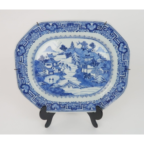 2351 - A SET OF THREE CHINESE EXPORT BLUE AND WHITE OCTAGONAL PLATTERSthe platters depicting pagodas amongs... 