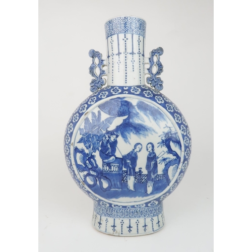 2358 - A CHINESE BLUE AND WHITE PILGRIM BOTTLE painted with panels of figures in gardens within a blossom g... 