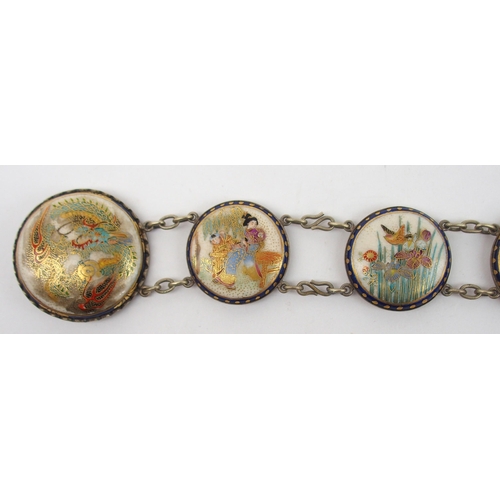 2374 - A SATSUMA LADIES BUTTON BELT painted with dragons, figures, insects and birds, on stamped silver mou... 
