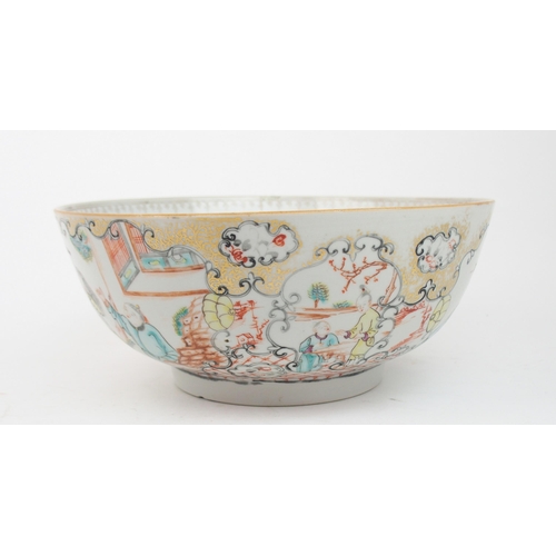 2377 - A CHINESE FAMILLE ROSE PUNCH BOWL painted with figures within scrolling panels and diaper, 26cm diam... 
